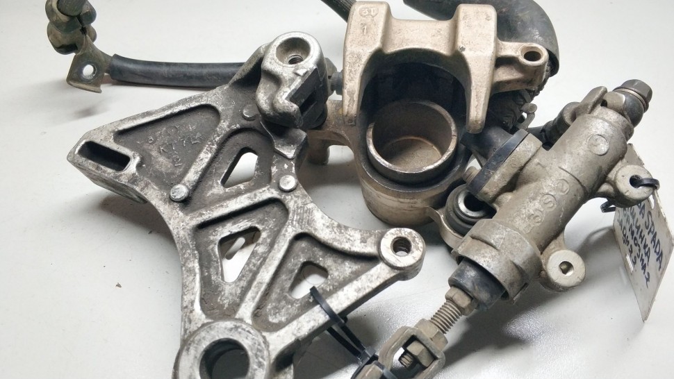 Тормозная система(суппорт, поршень, гидролиния) Honda VT 250 Spada